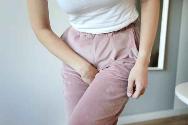 woman running for the toilet because of urinary incontinence Stoke-upon-Trent